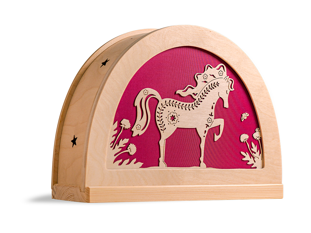 Folklore paard silhouet in houten silhouetlamp met warm roze licht