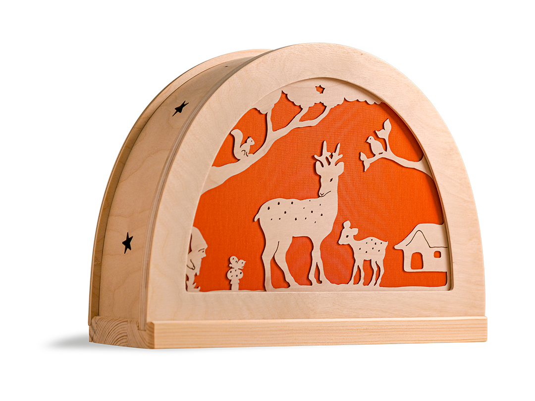 Silhouet hertjes in het bos in houten silhouetlamp voor seizoentafel