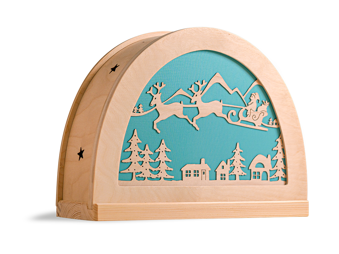 Kerstman in slee silhouet in houten silhouetlamp voor seizoentafel